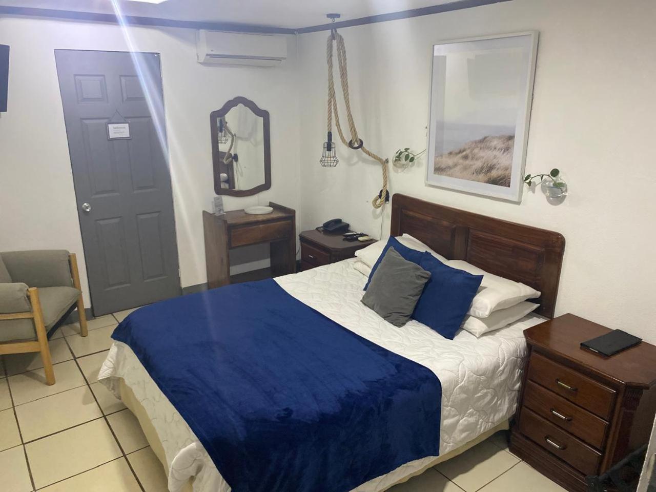 Berlor Airport Inn Rio Segundo Phòng bức ảnh